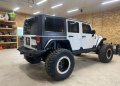 2014 Jeep Wrangler Unlimited w/ tons and 40's